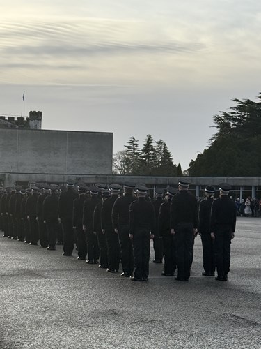 Officers stand to attention at passing out parade