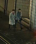 CCTV image of two women walking on street