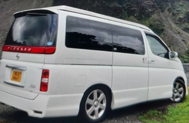 White Nissan Elgrand campervan
