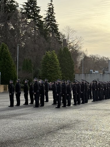 Officers stand to attention