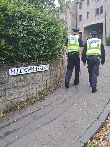 Officer walking up the Hilltown, Dundee