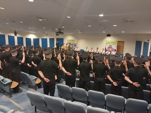 Probationers take the oath of office at a ceremony in Jackton